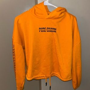 Orange with black writing sweatshirt